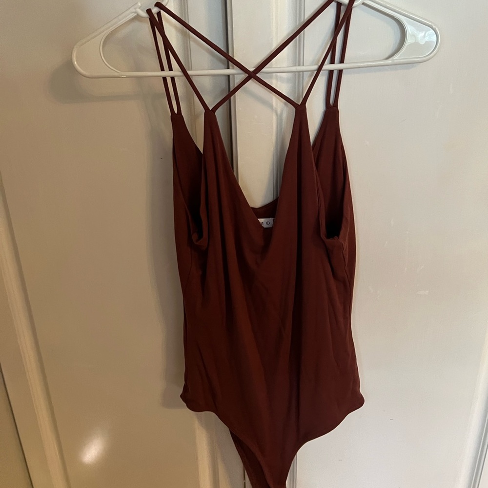 Boutique burgundy body suit with front strap design NEVER WORN